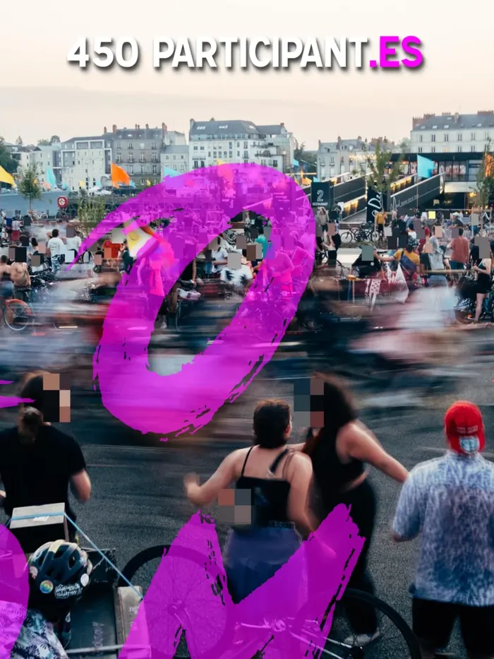 Photographie de l'arrivée de la Véloboomboom, où des cyclistes tournent autour de personnes arrêtées avec leur vélos. Le titre est 450 participant·es.